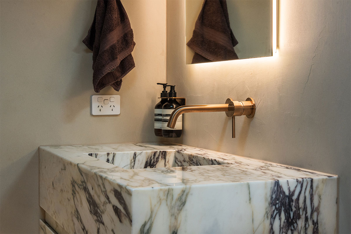 Beige microcement bathroom at Flinder Park